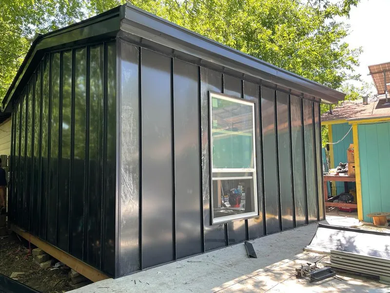 Black standing seam metal wall panels for Metal Roof Installation in Warwick